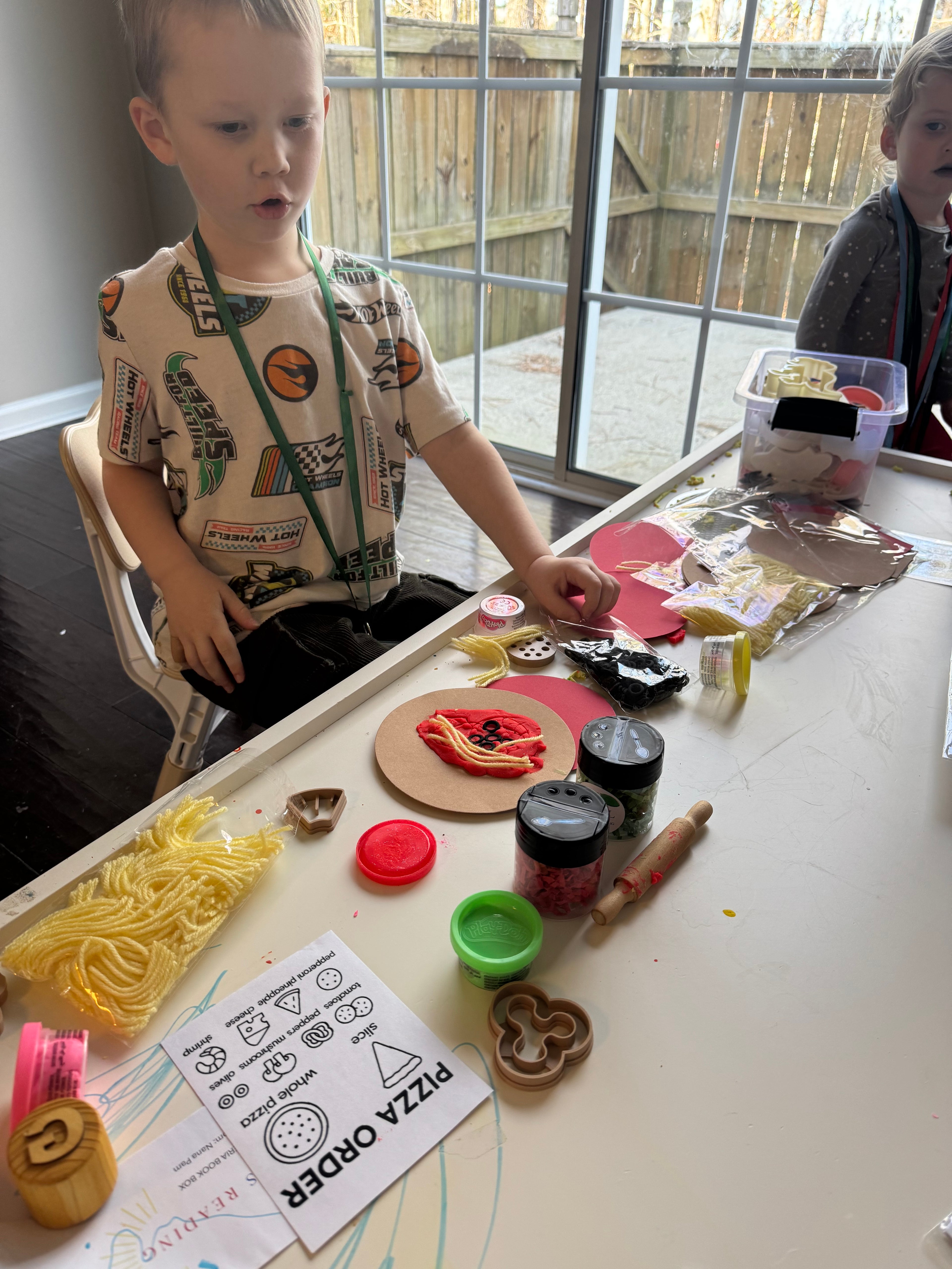 Pizzeria box without hard case, book, & play dough cutters